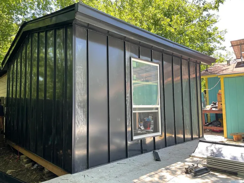 Black standing seam metal wall panels for Metal Roof Installation in Pawtucket