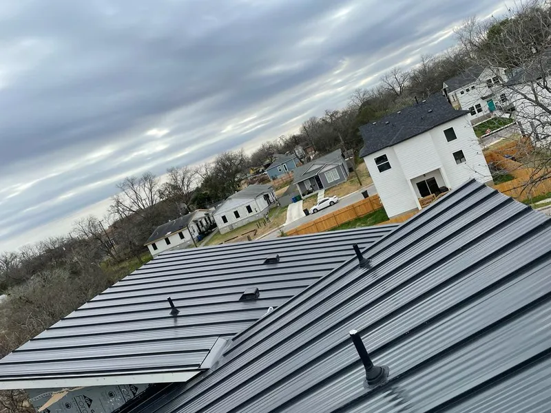 Standing seam metal roof panels with vents for Skylight Repair in Pawtucket